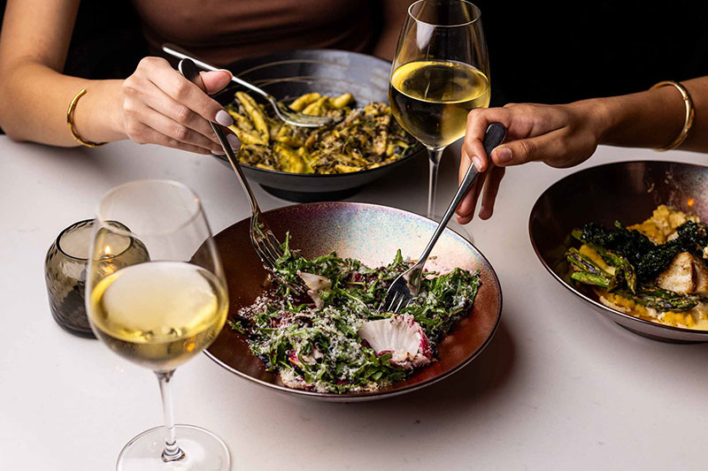 salad and wine at cavalier san antonio